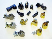 Commutator brush holders